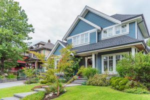 Large suburban blue home